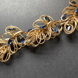 Napier Bracelet Vintage Blue Rhinestones Loopy Gold Tone Metal Construction