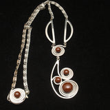 Modernist Swirl Necklace with Brown Stones
